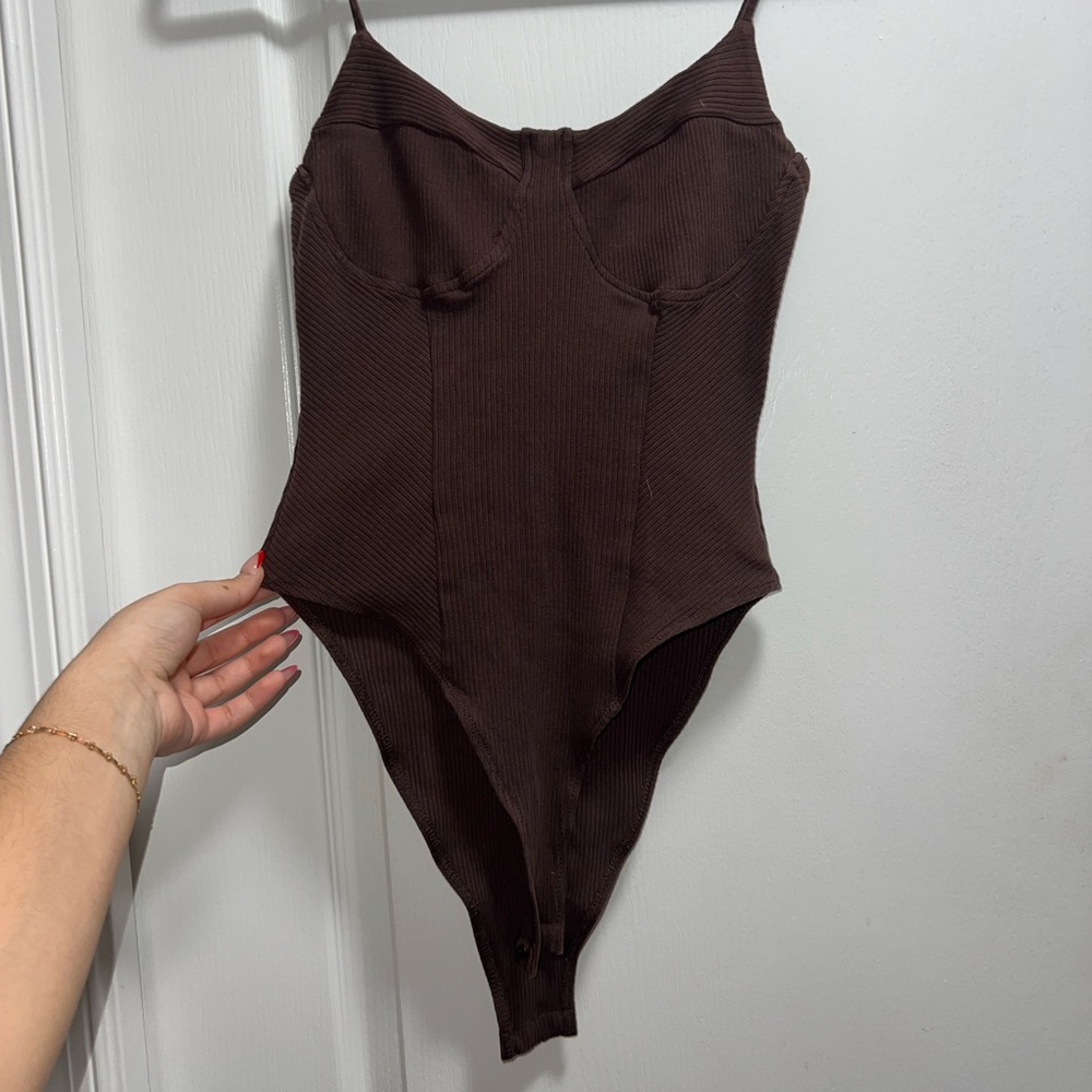 Subtle mocha-brown spaghetti strapped bodysuit.